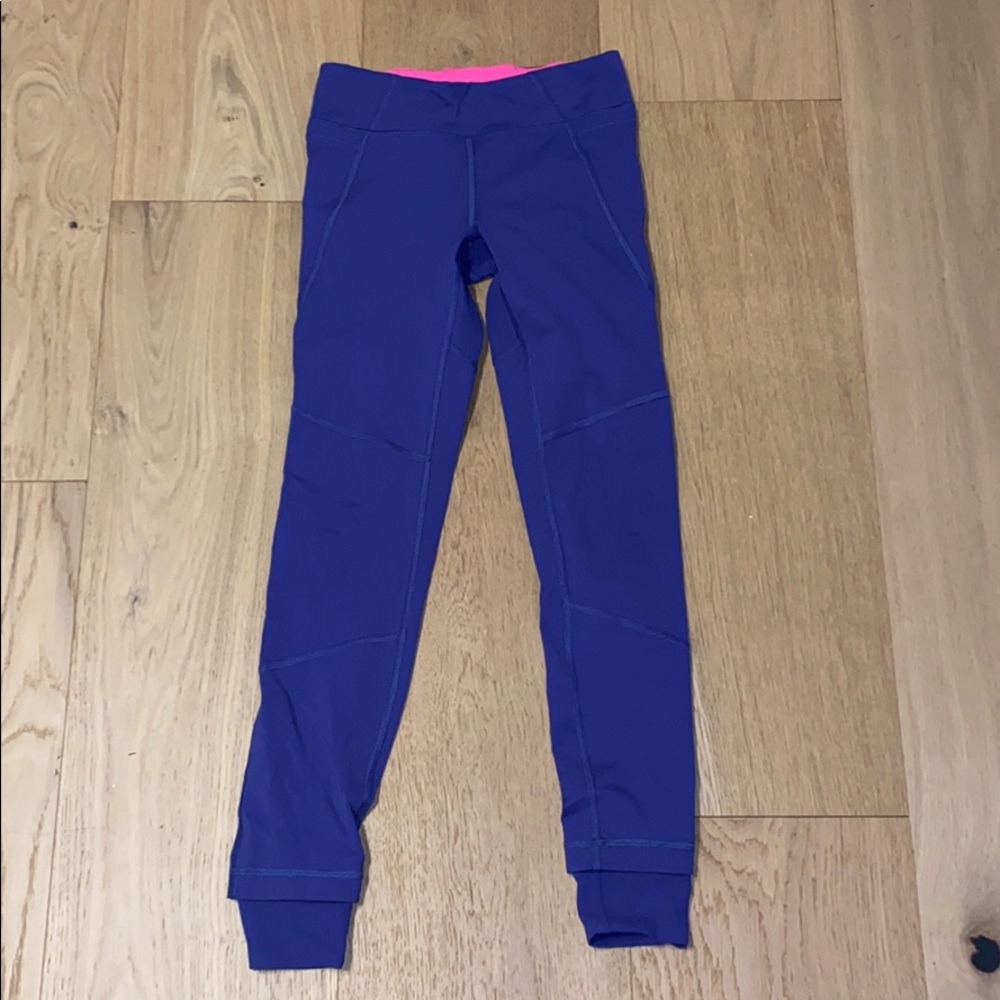 purple ivivva leggings with lots of pockets